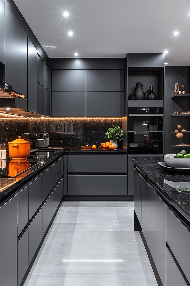 Charcoal grey fitted kitchen cabinets with wooden worktop and tall units