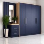 Navy blue fitted wardrobe with matching dressing table and mirror, built by Rusar Best Furniture in Accra
