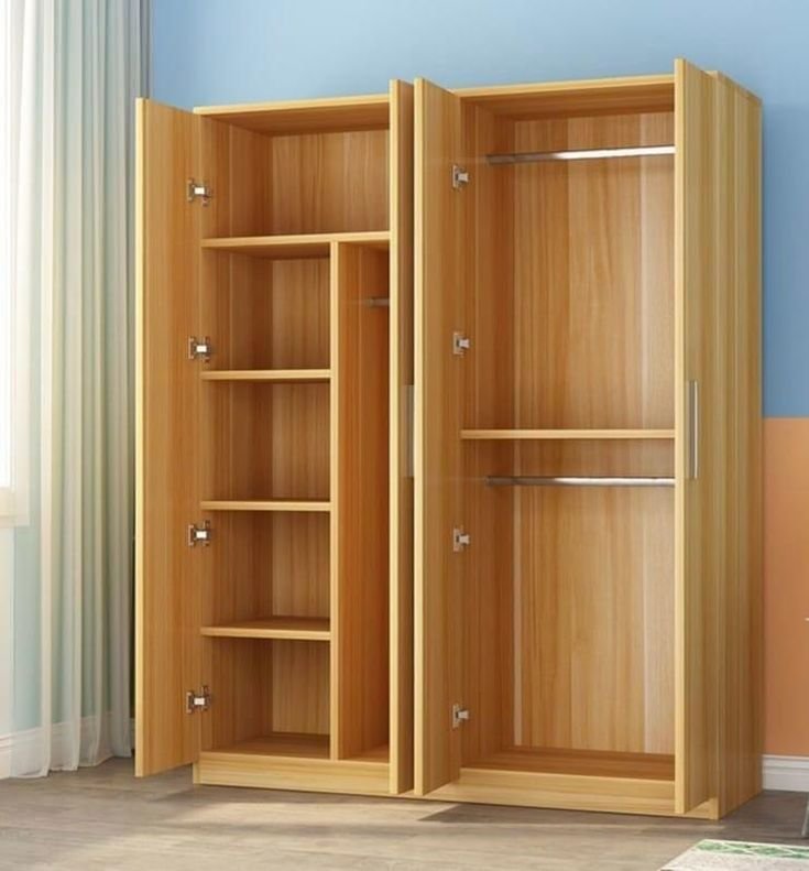 Light oak wardrobe interior showing shelving, a centre divider and hanging rails
